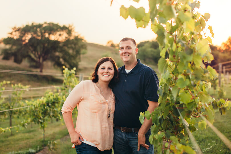 Joe and Melanie in the vineyard at their family farm in Glenwood Minnesota