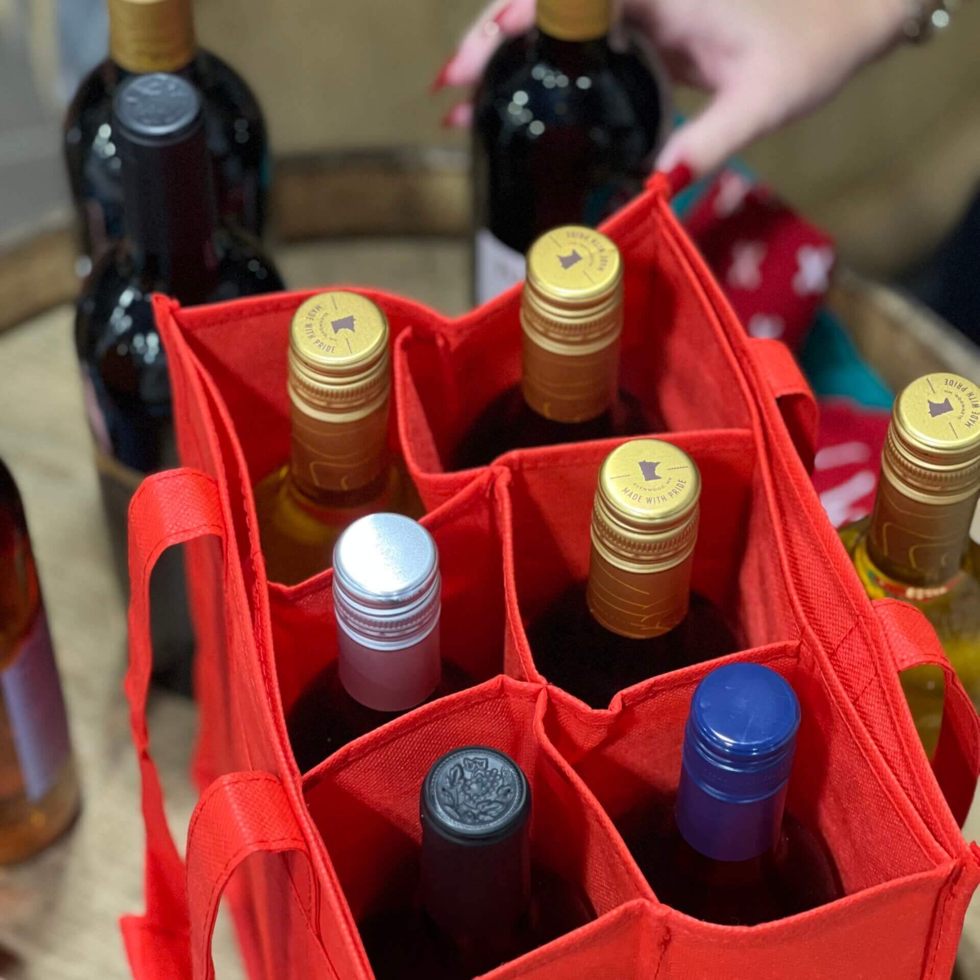 bottles of wine in a bag for wine club order, rolling forks vineyards, glenwood, minnesota